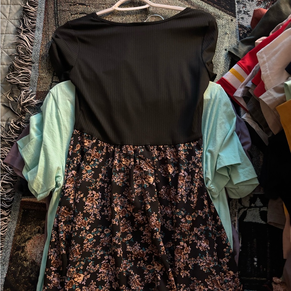 Black and floral dress goes a little above the knee